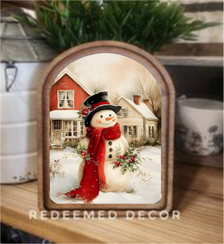6x8 arch top framed art of a cozy Christmas snowman